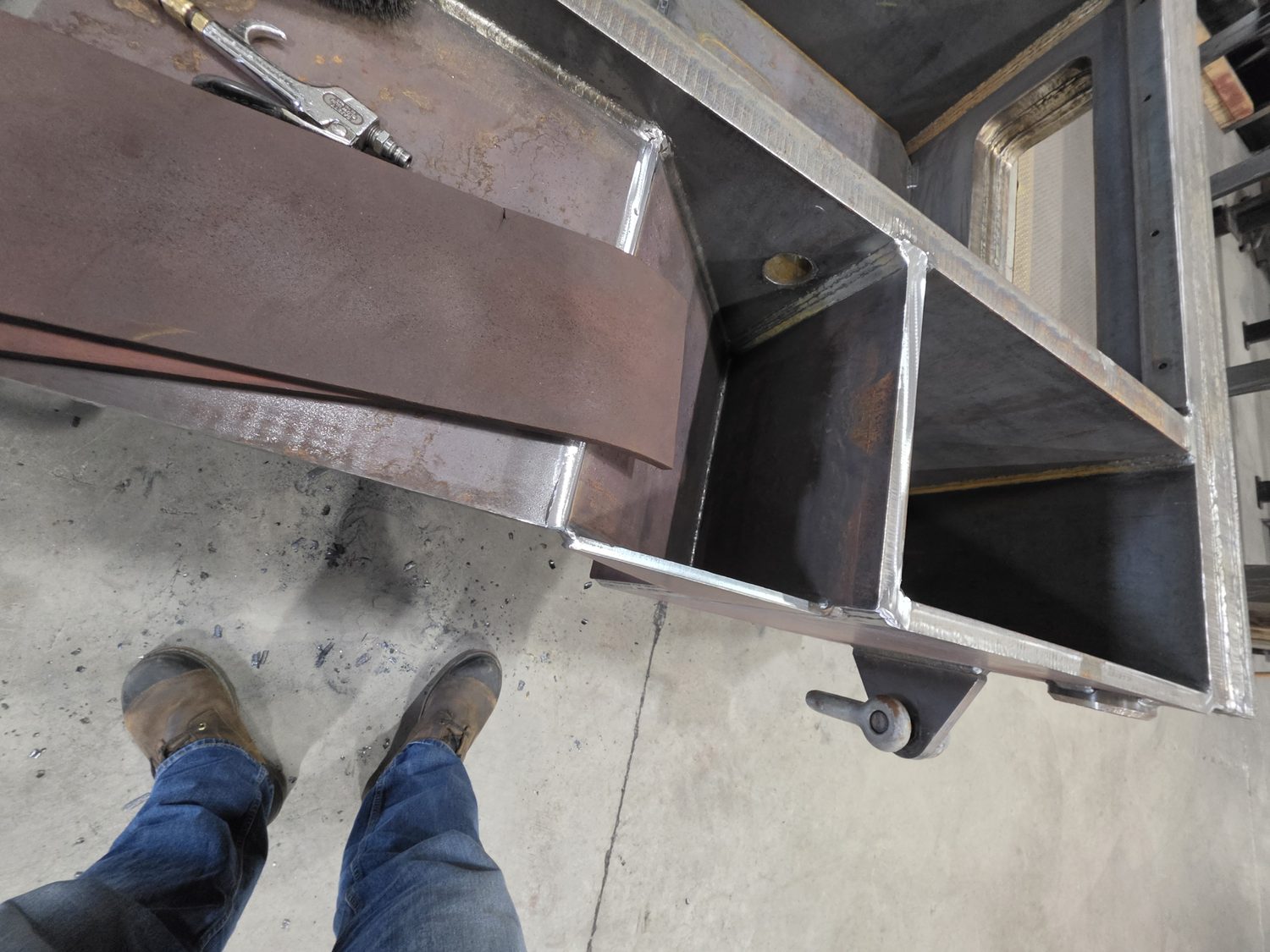 Heavy structural steel weldment with gusseted connections