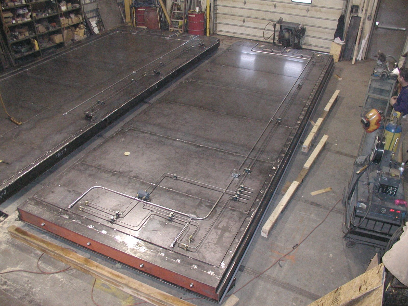Large fabricated steel plate door assembly